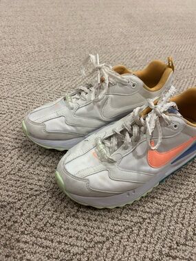 Women’s Nike White Sneakers with Coral Swoosh